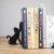 metalowa podpórka kot podtrzymujący książki