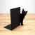 czarny metalowy stojak z motywem kota