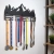Metalowy wieszak na medale dla entuzjastów górskich biegów lub wędrówek